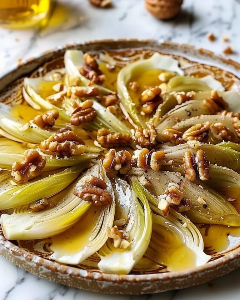 Salade d'endives avec fromage Comté et noix, plat savoureux et sain